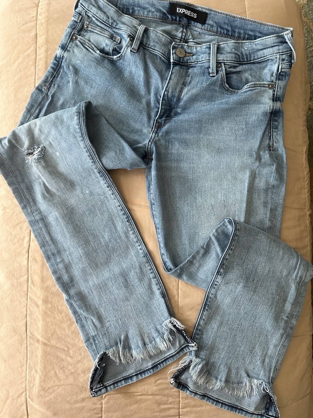 Express Women's Light Wash Skinny Jeans with Frayed Hem